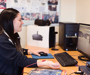 student using equipment