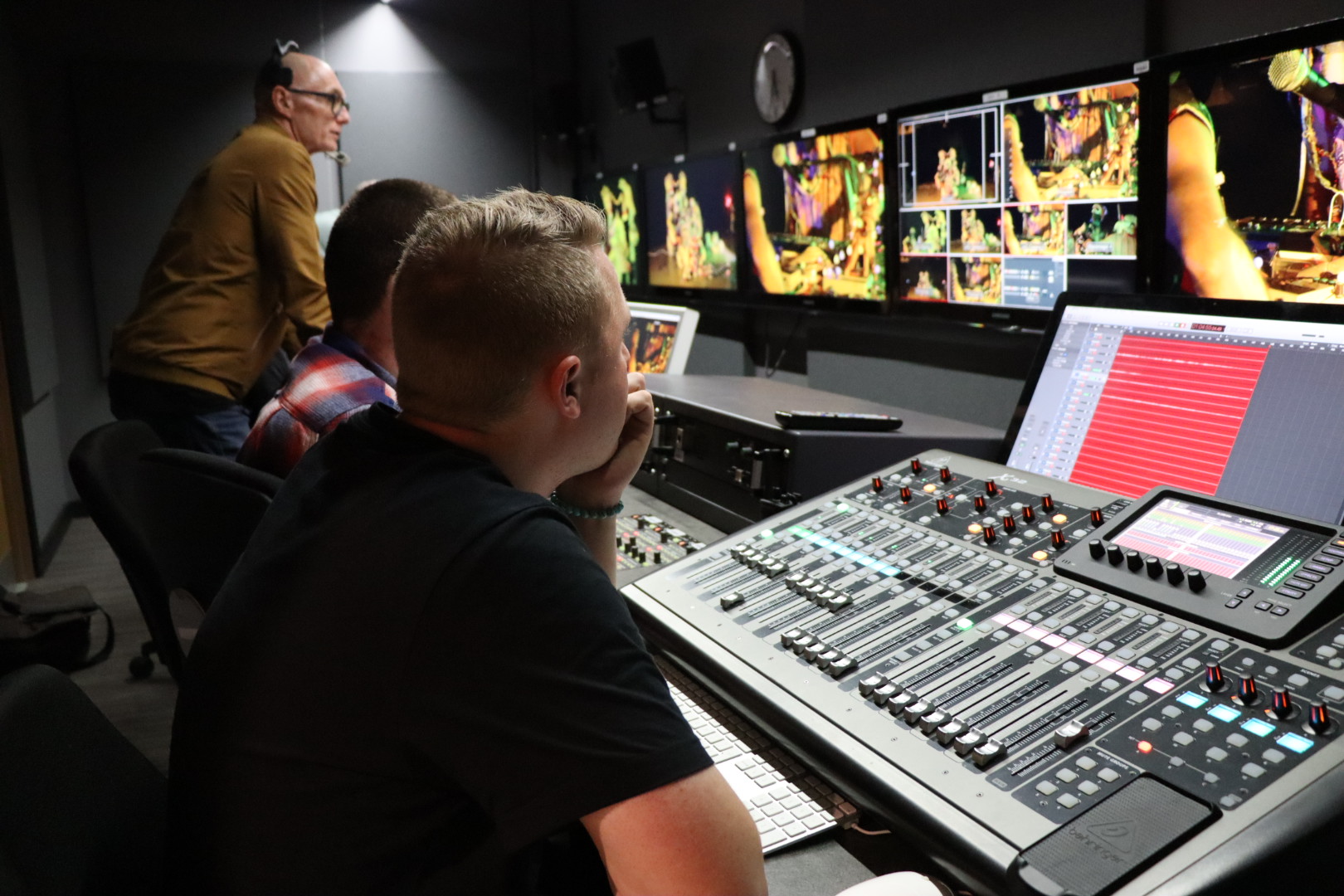 media students in front of equipment and screens