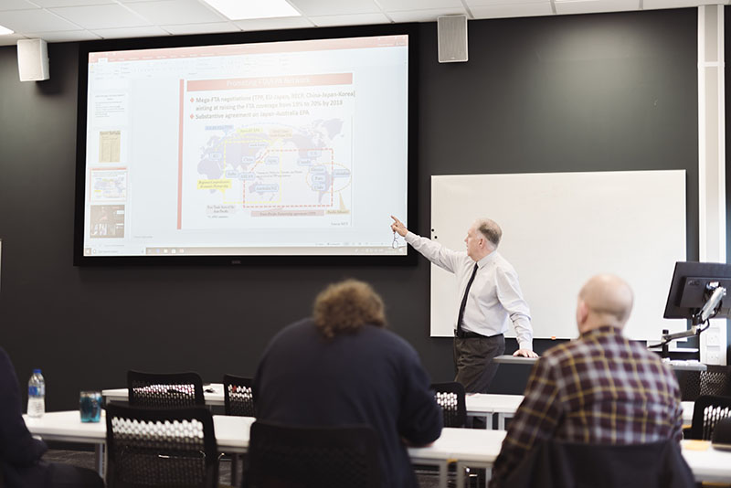 Business teacher giving a lecture
