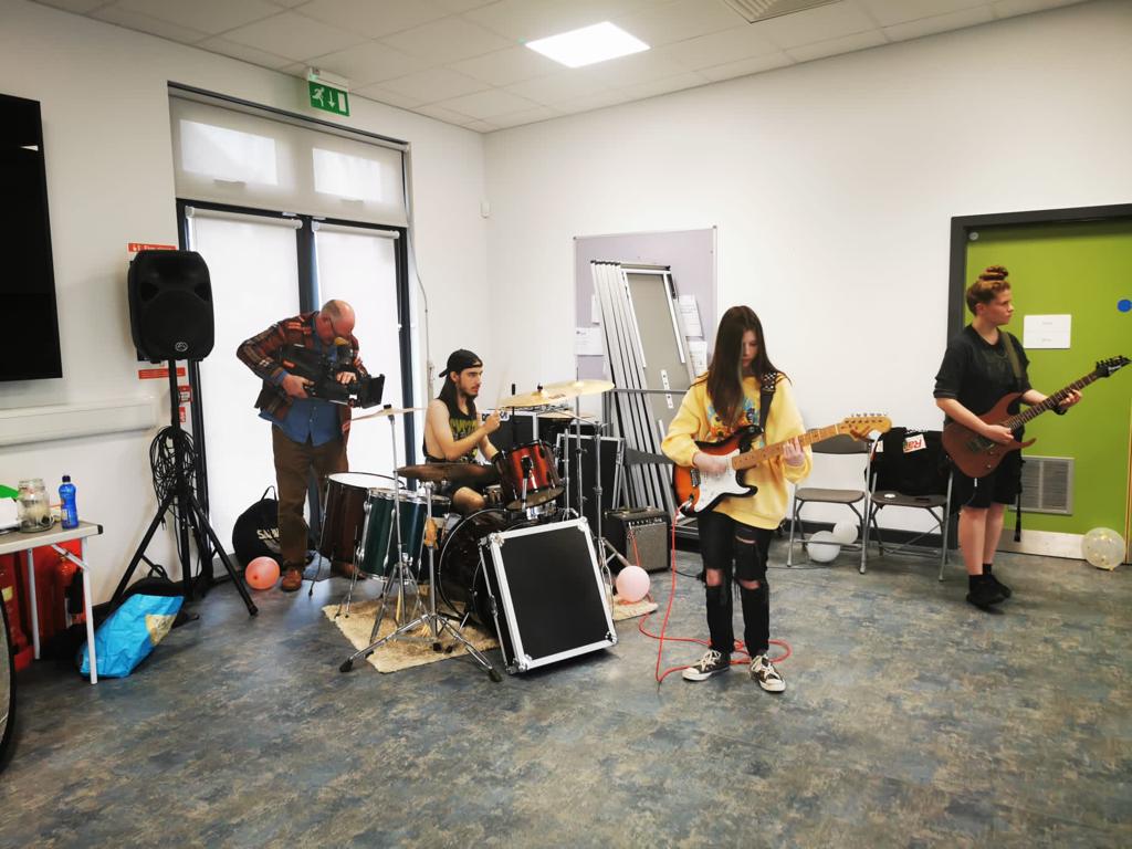 A band being filmed