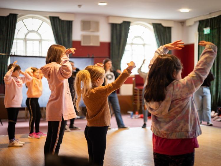 Young people learning how to dance