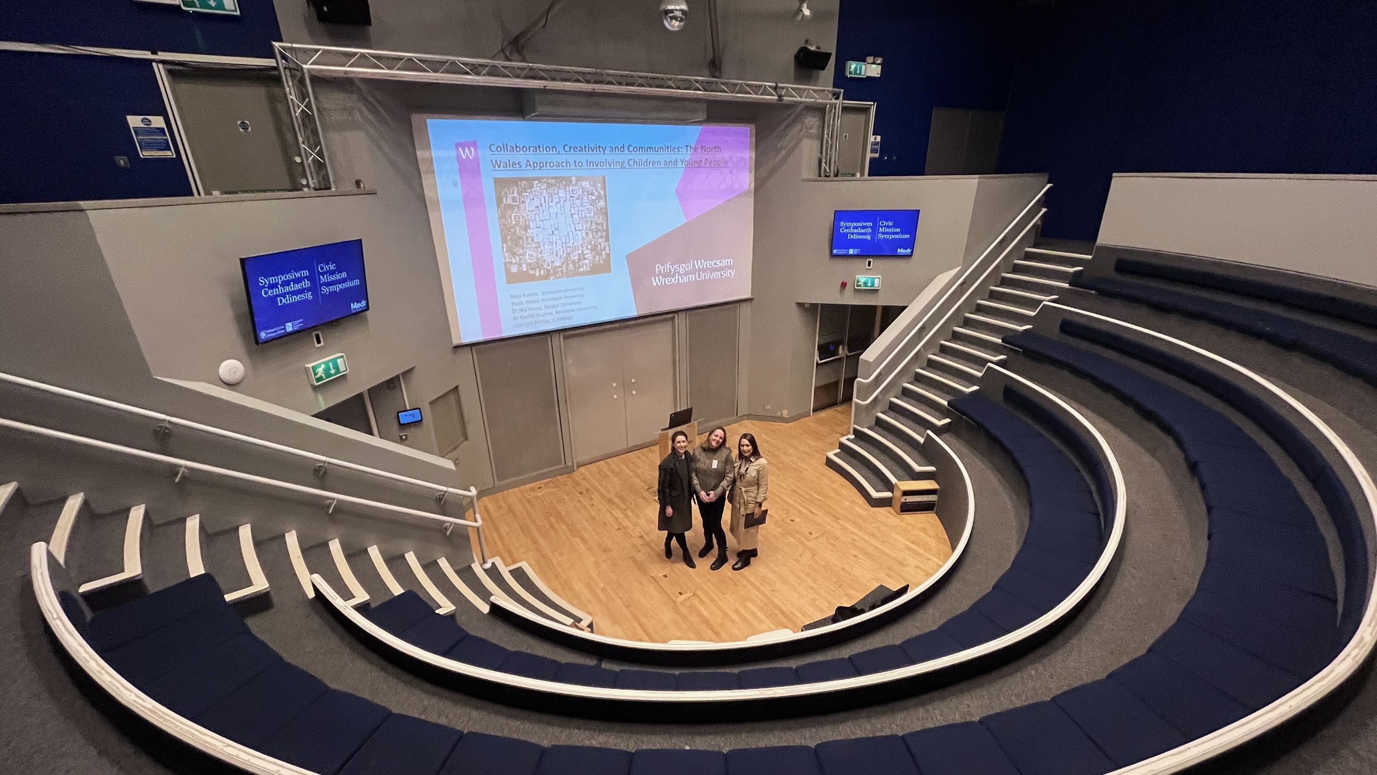 Nina Ruddle, Sonia John and a third person attending the Civic Mission Symposium at the Senedd in Cardiff.