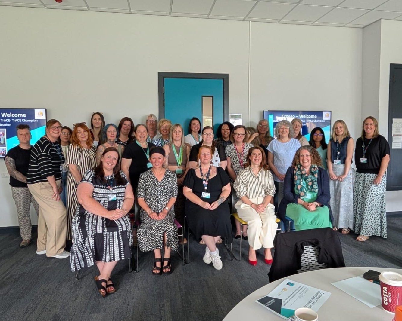 A group of Wrexham University TrACE champions taking a photo.