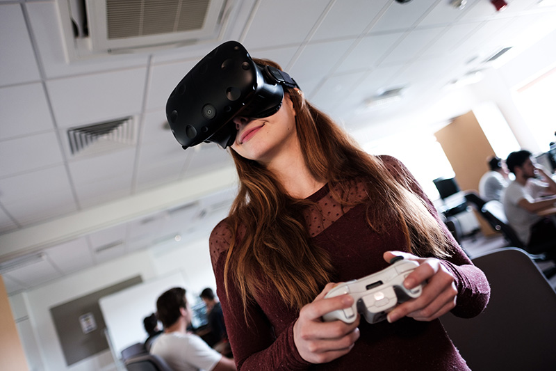 A student using a VR game