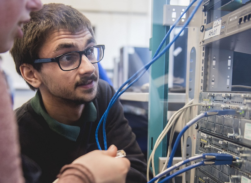 A computing student working on a project
