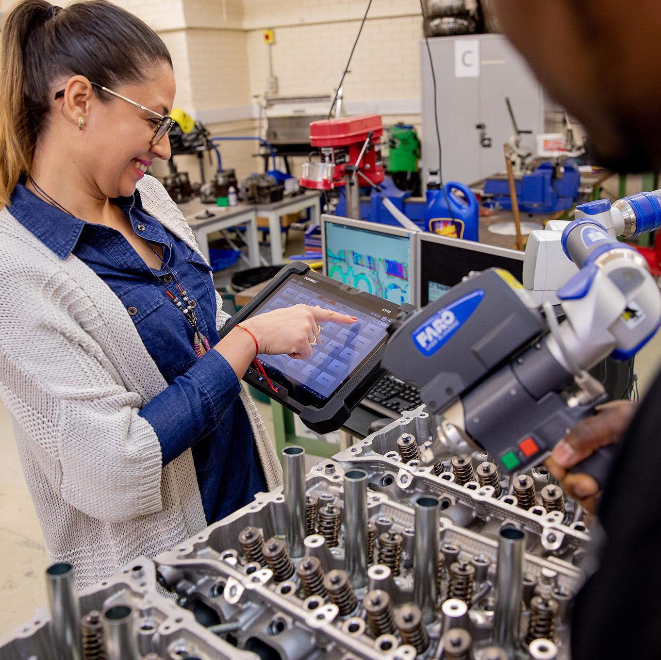 A student in our engineering labs using the equipment