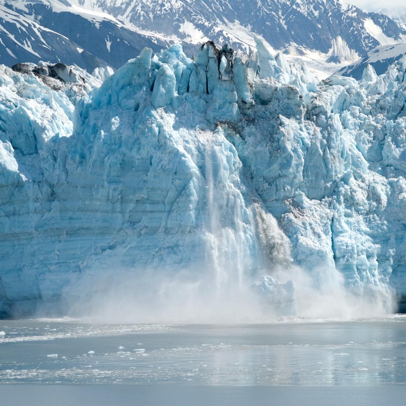 A glacier melting into the ocean