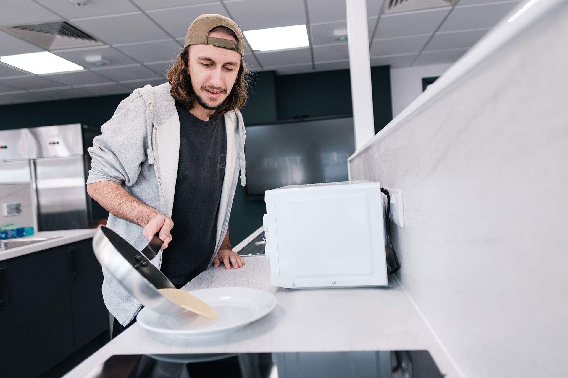 Student using the Nutrition and Dietetics Kitchen