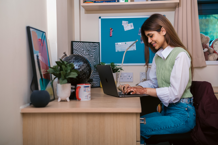 female student on laptop