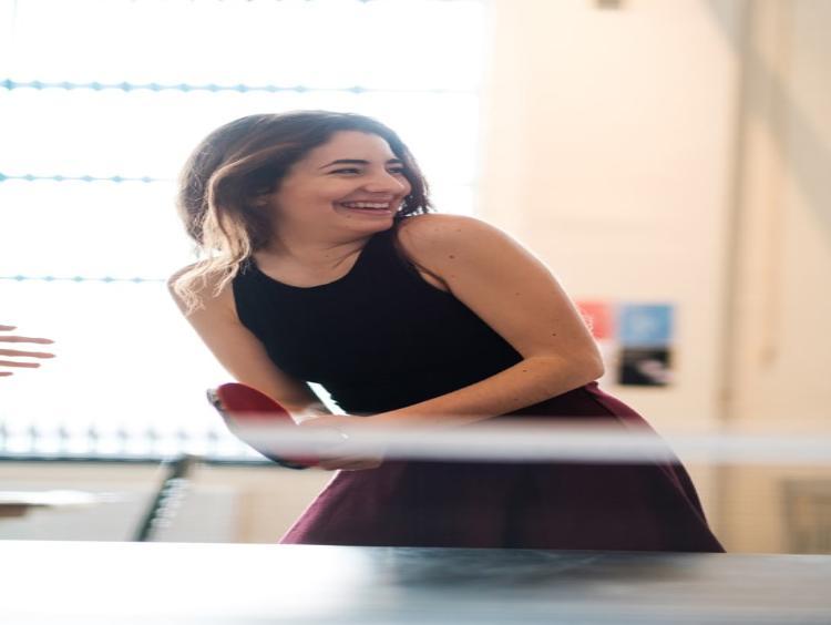 Student playing table tennis