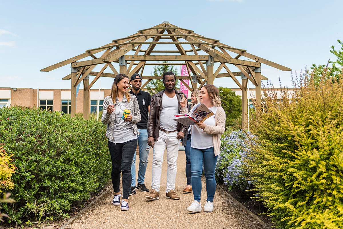 A group of students walking outside campus