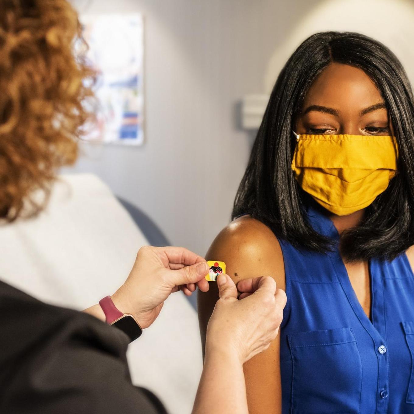 A woman getting a vaccine