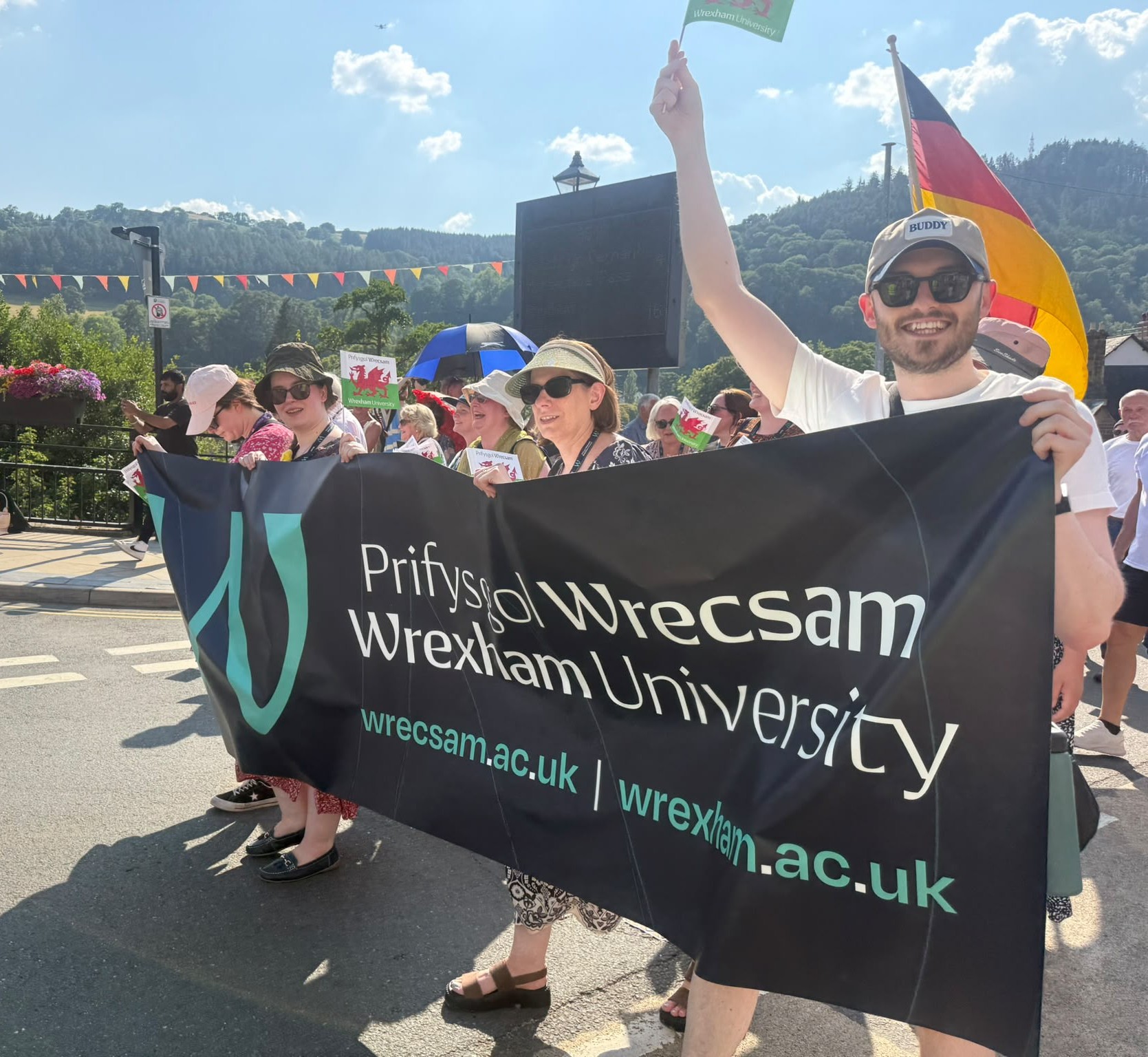 Wrexham University staff take part in the Parade of Nations at the Llangollen Eisteddfod