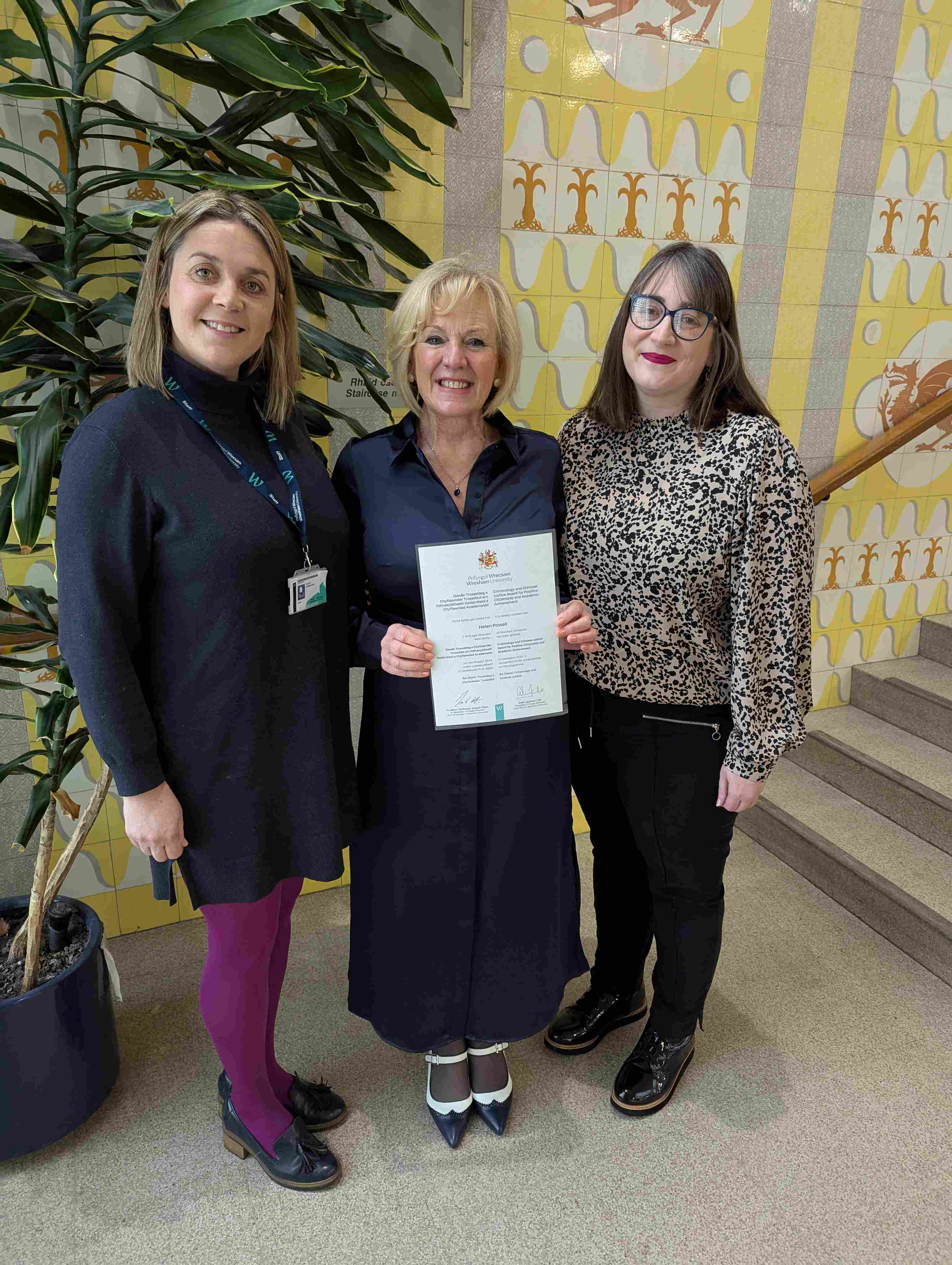 Helen Powell, Criminology and Criminal Justice student, receiving award from Dr Jo Prescott and Dr Sarah Dubberley.