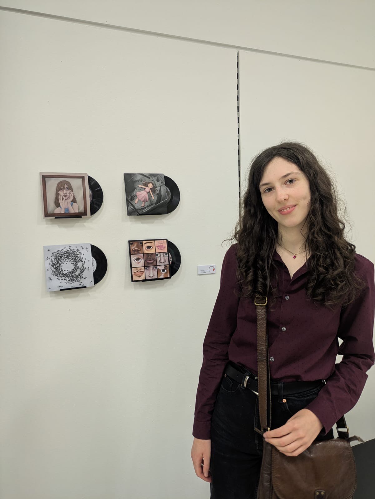 Student with vinyl sleeve artwork