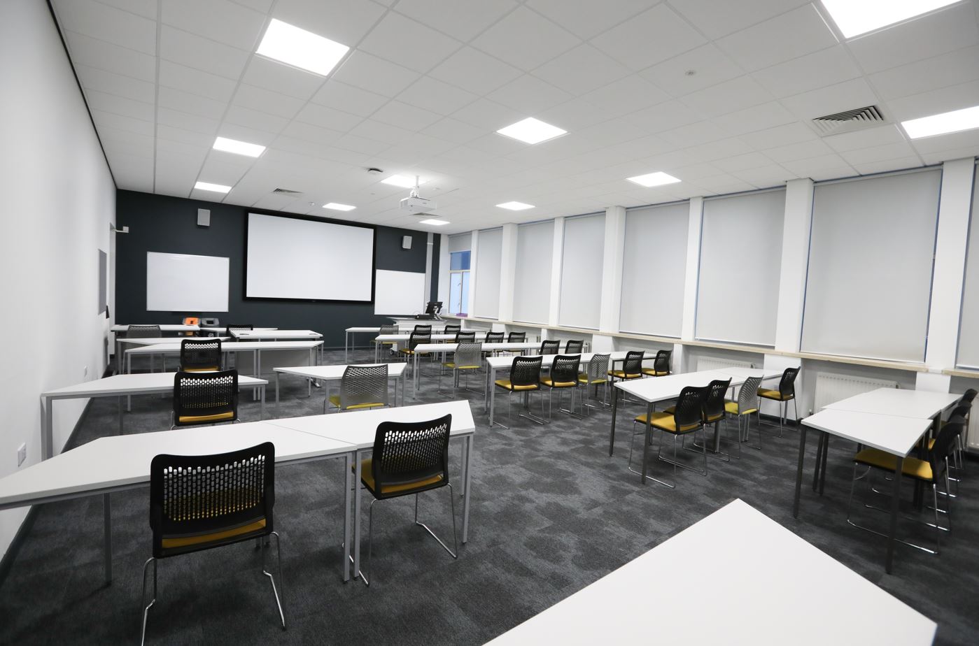 Tables and chairs in a classroom