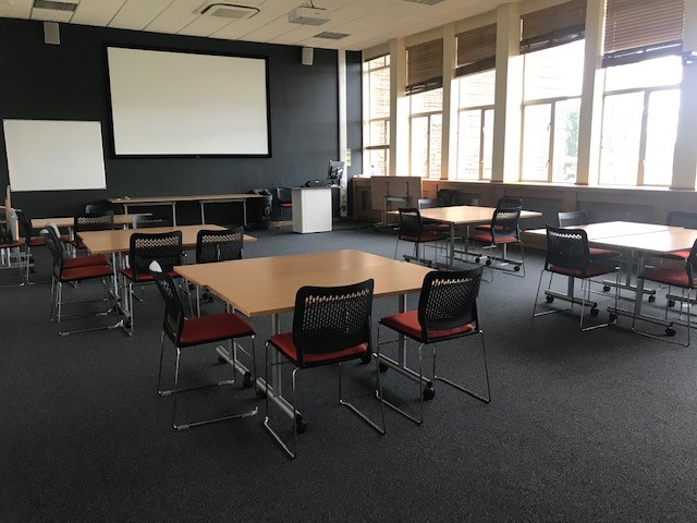 Tables and chairs in a classroom
