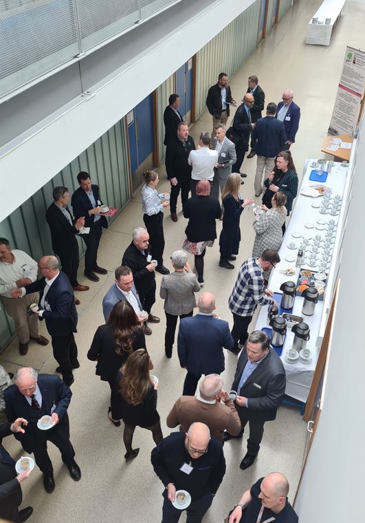 People networking in an exhibition area