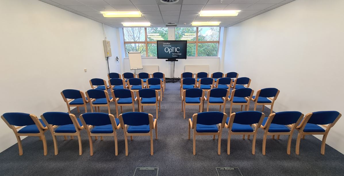 A room with chairs arranged in rows