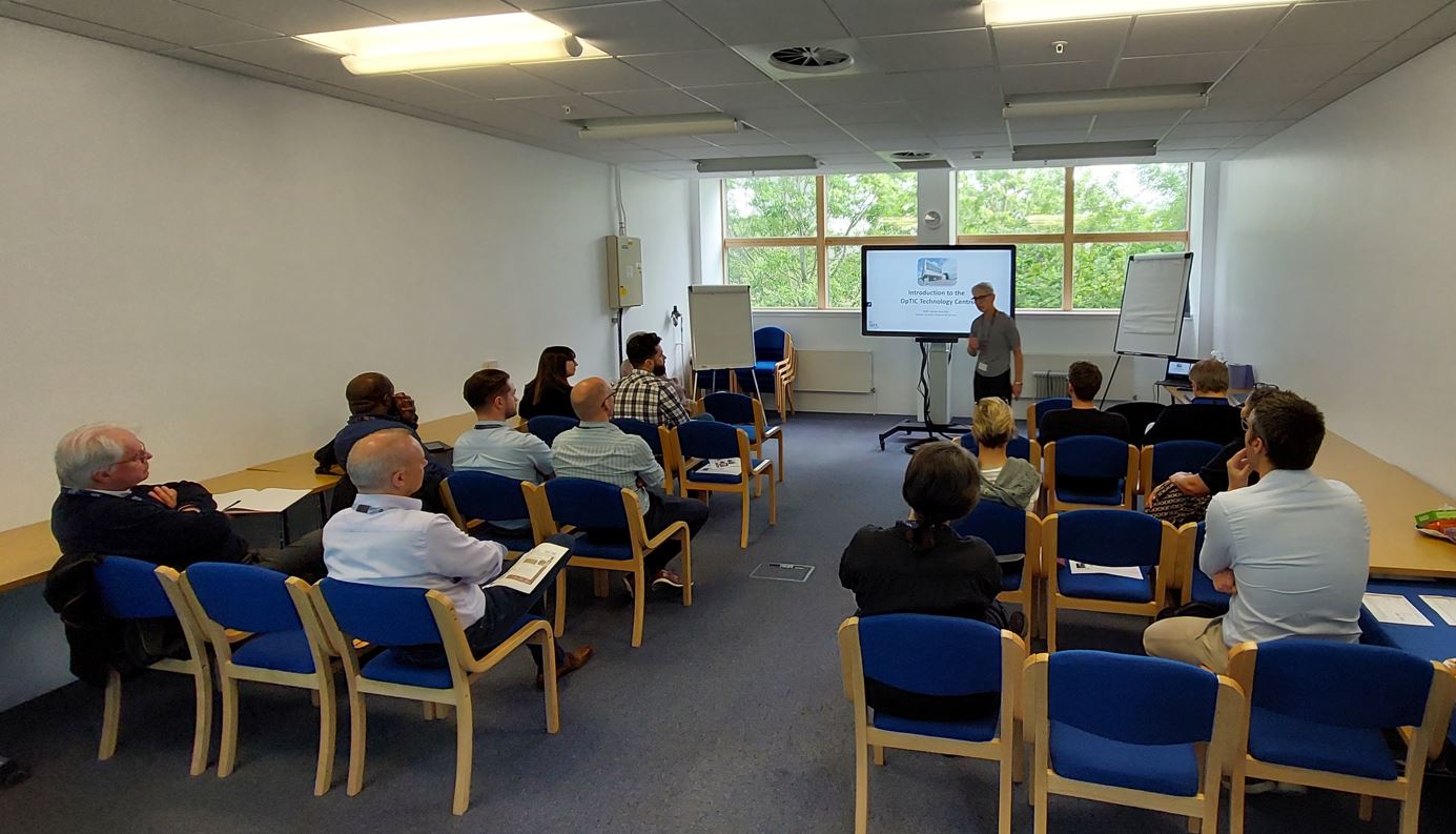 People sat watching a presentation