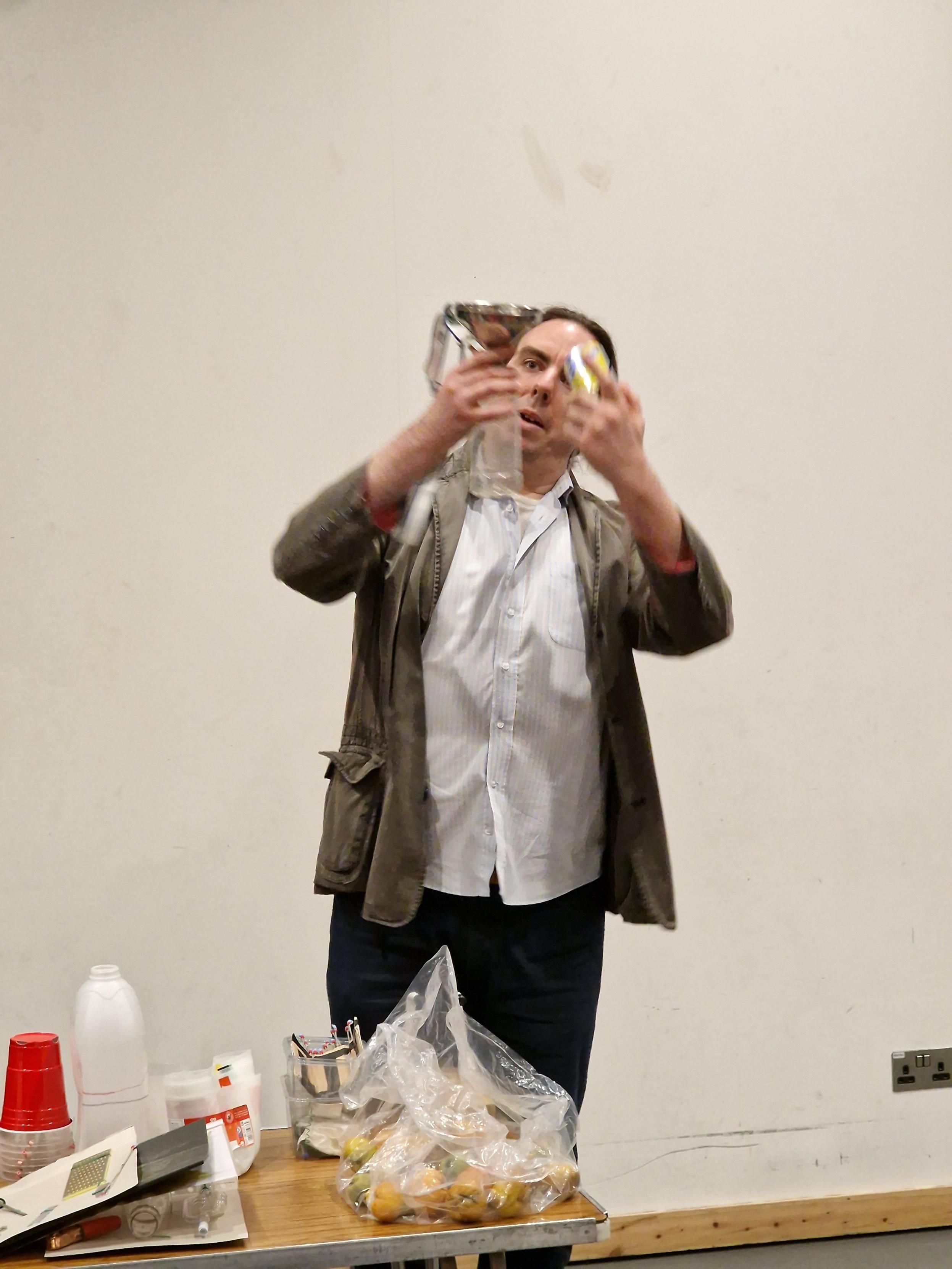 Person holding an upcycled container