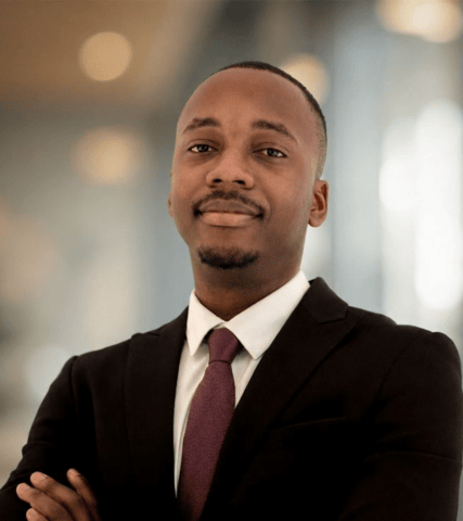 Headshot of a man in a suit