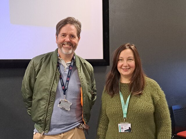 Jason and Viktoriia standing after presenting open house