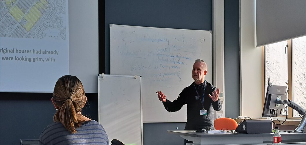 gareth carr presenting at the front of class