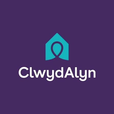 clwydalyn logo - a purple background with a green house and ampersand inside it