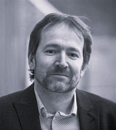 black and white headshot of ian