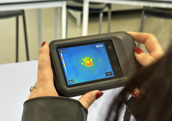 a scanner with a handprint on