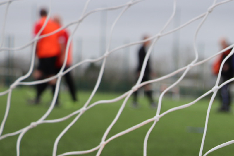 People playing football