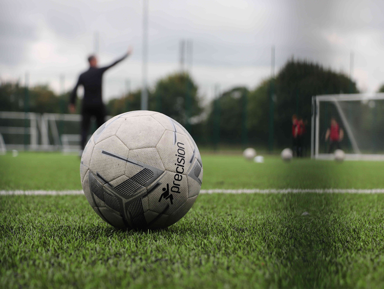Football on a pitch