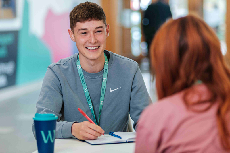 A student is interviewed during the Clearing process at Wrexham University.